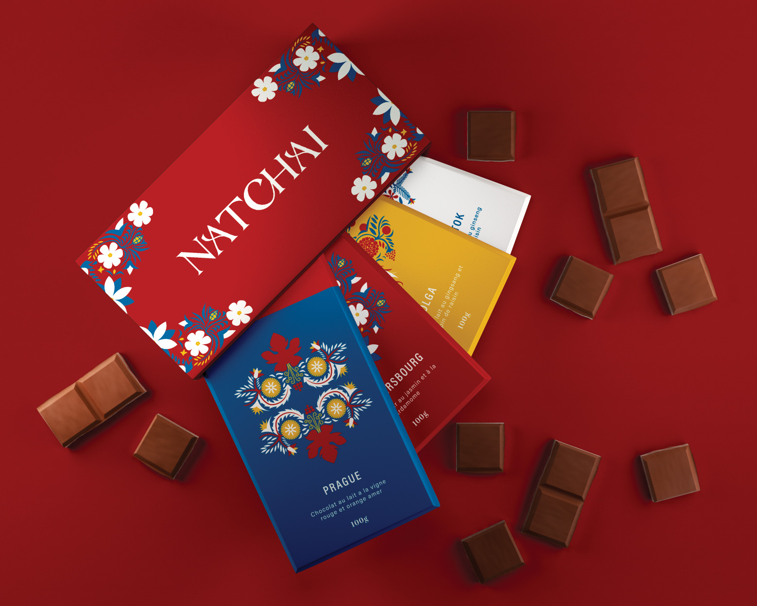 Packaging chocolat,  Natchai sur fond rouge avec chocolats, motif floral